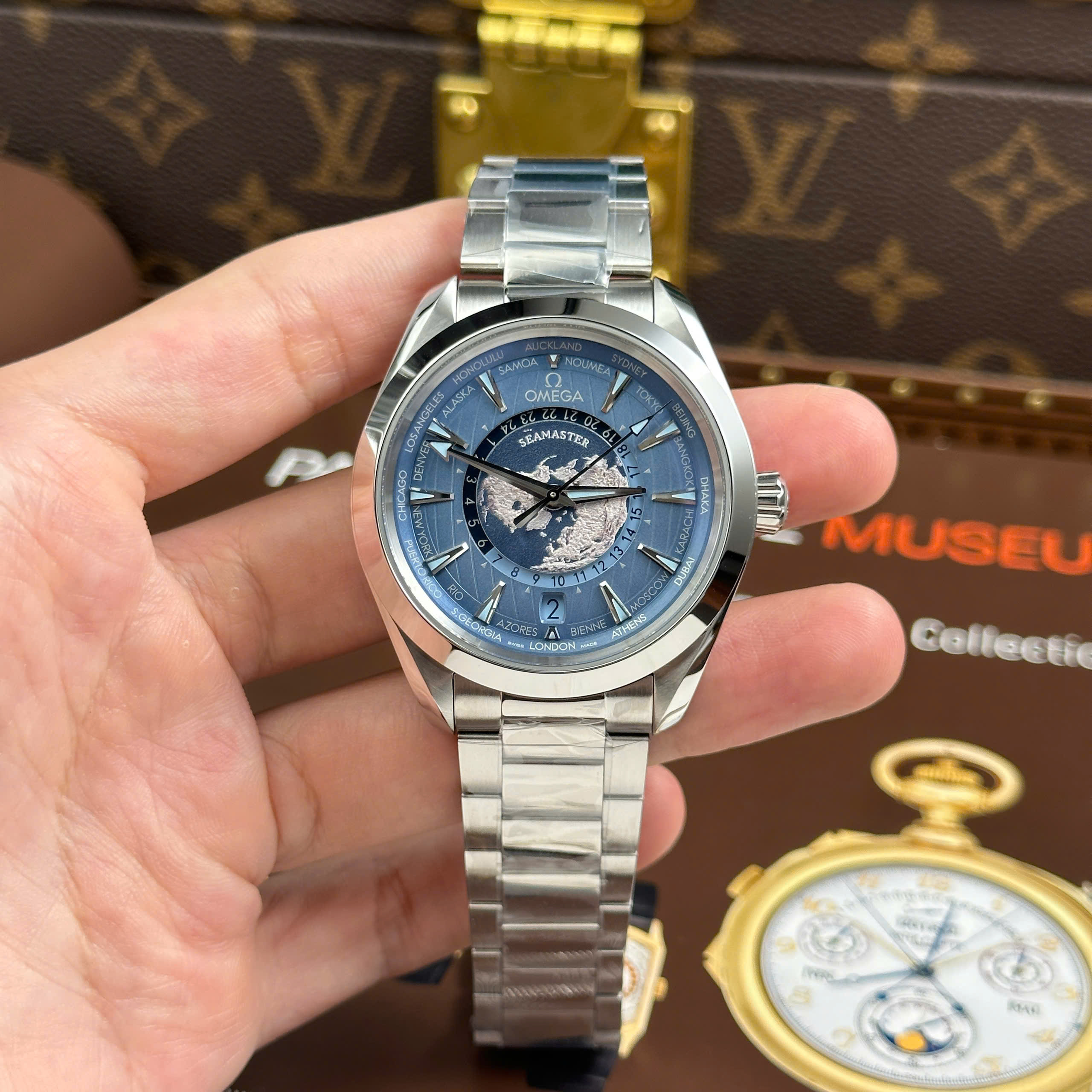 Đồng Hồ Omega Seamaster Replica 11 Aqua Terra Worldtimer Màu Xanh Dương 43mm (12) Đồng Hồ Omega Seamaster Rep11 Aqua Terra Worldtimer Màu Xanh Dương Dây Kim Loại 43mm