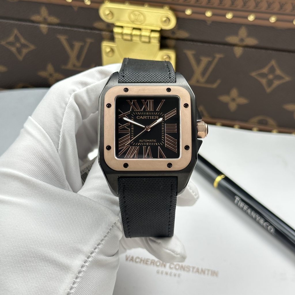 Đồng Hồ Cartier Santos Fake Cao Cấp 100 XL Black ADLC Mặt Đen Viền Vàng Hồng 41x51mm