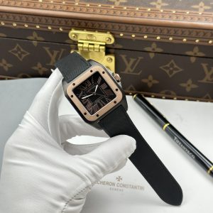 Đồng Hồ Cartier Santos Fake Cao Cấp 100 XL Black ADLC Mặt Đen Viền Vàng Hồng 41x51mm