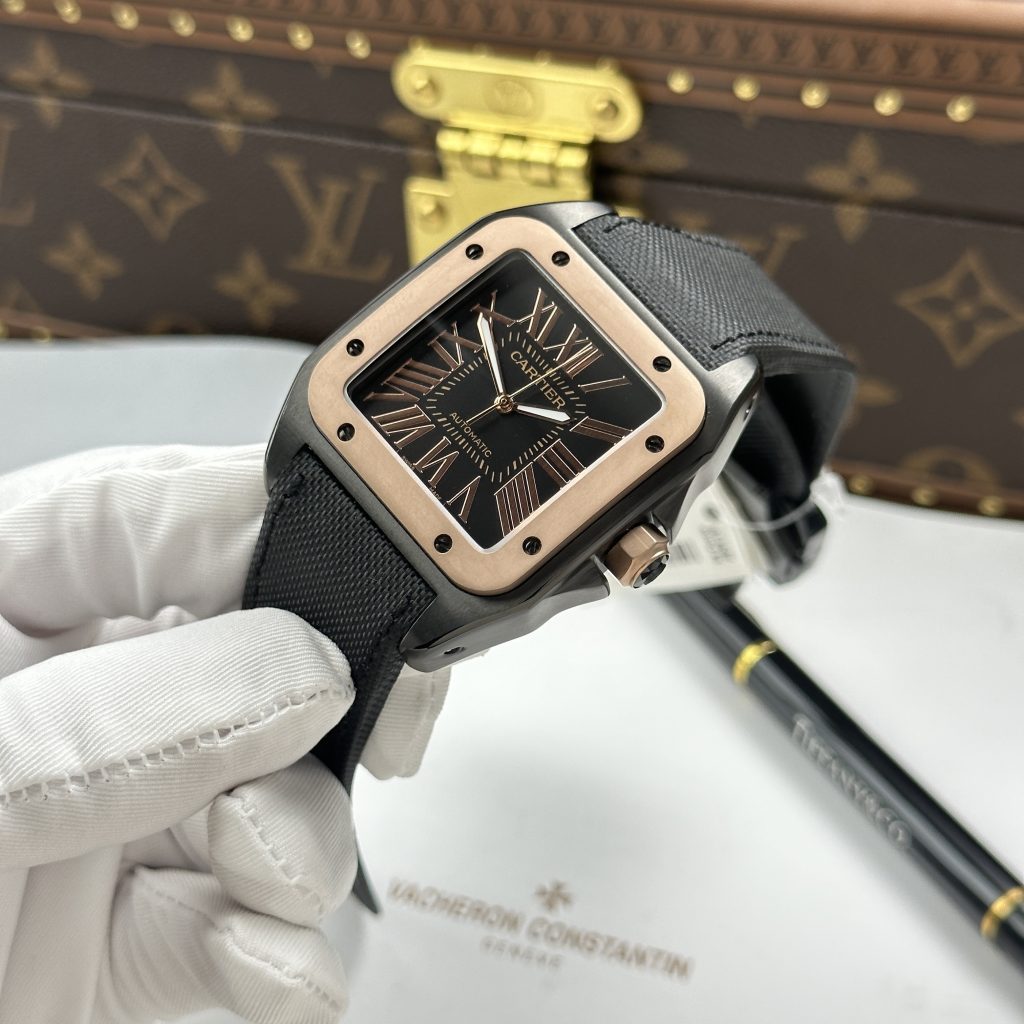 Đồng Hồ Cartier Santos Fake Cao Cấp 100 XL Black ADLC Mặt Đen Viền Vàng Hồng 41x51mm